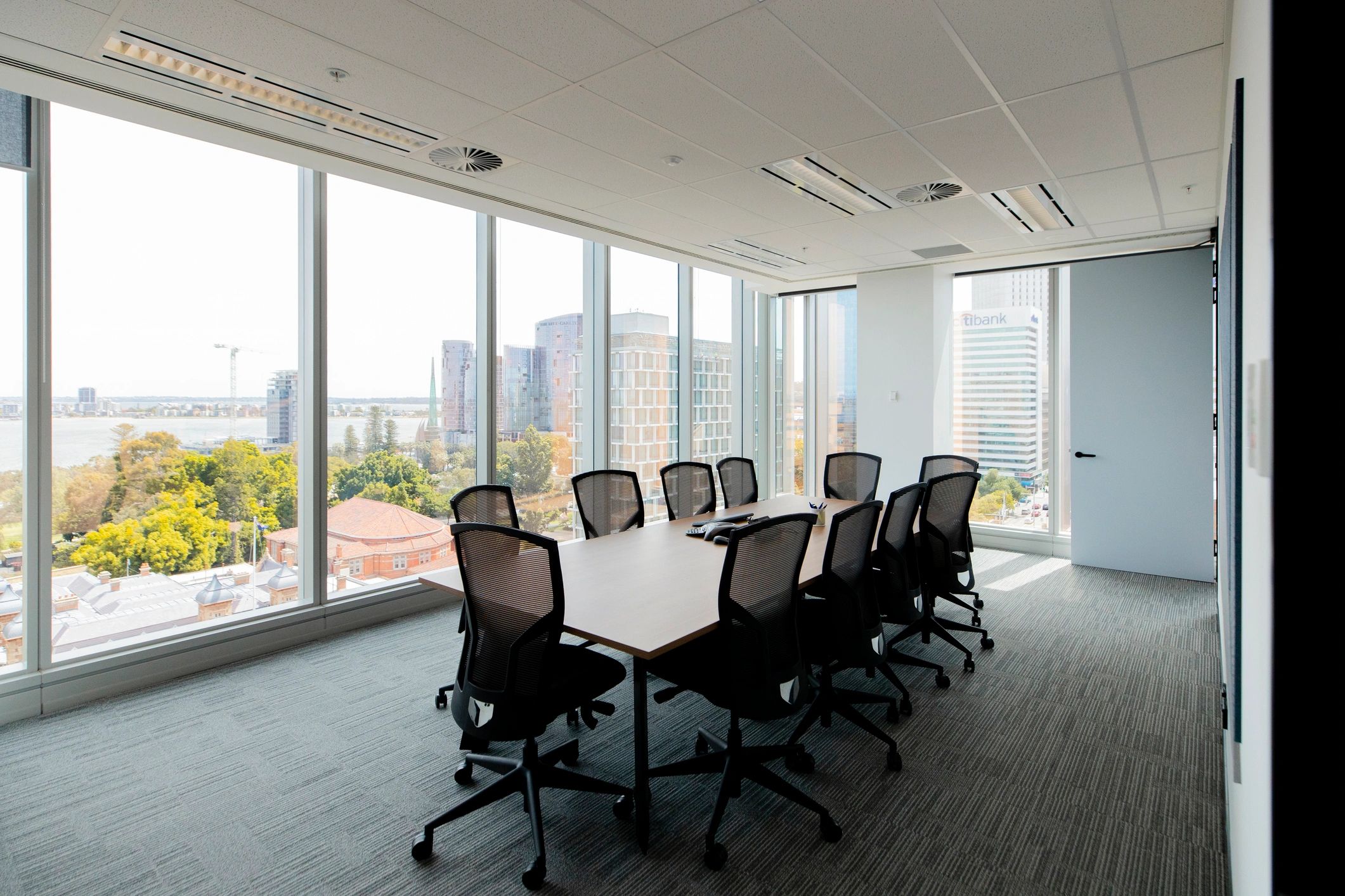 Boardroom with city view representing corporate governance and privacy oversight